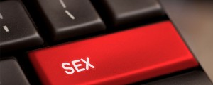 Sex addiction online behavior concept keyboard